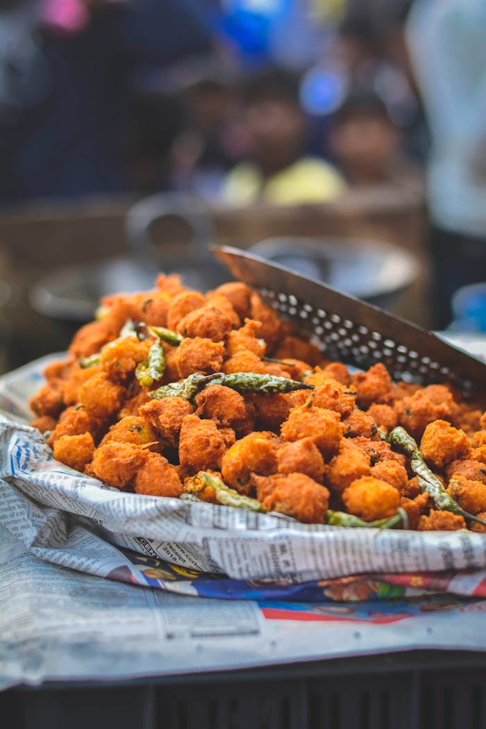 Delicious crispy street food served on a platter in Kolkata, India, showcasing local culinary culture.