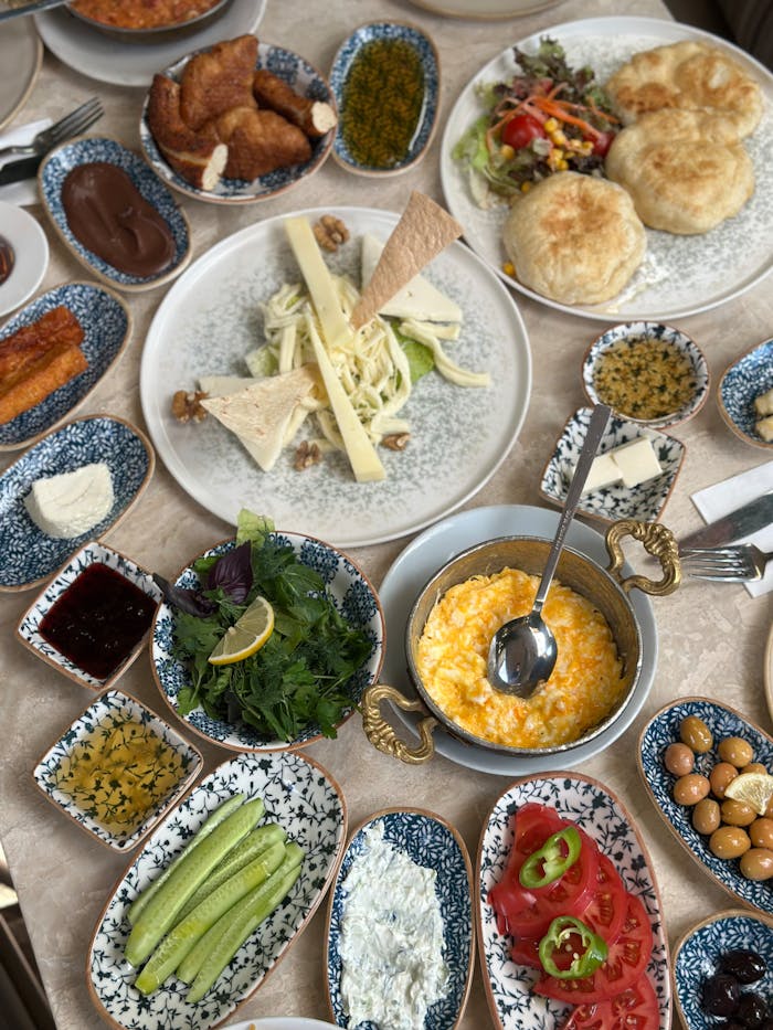 Colorful Turkish breakfast with diverse dishes, captured in Istanbul.